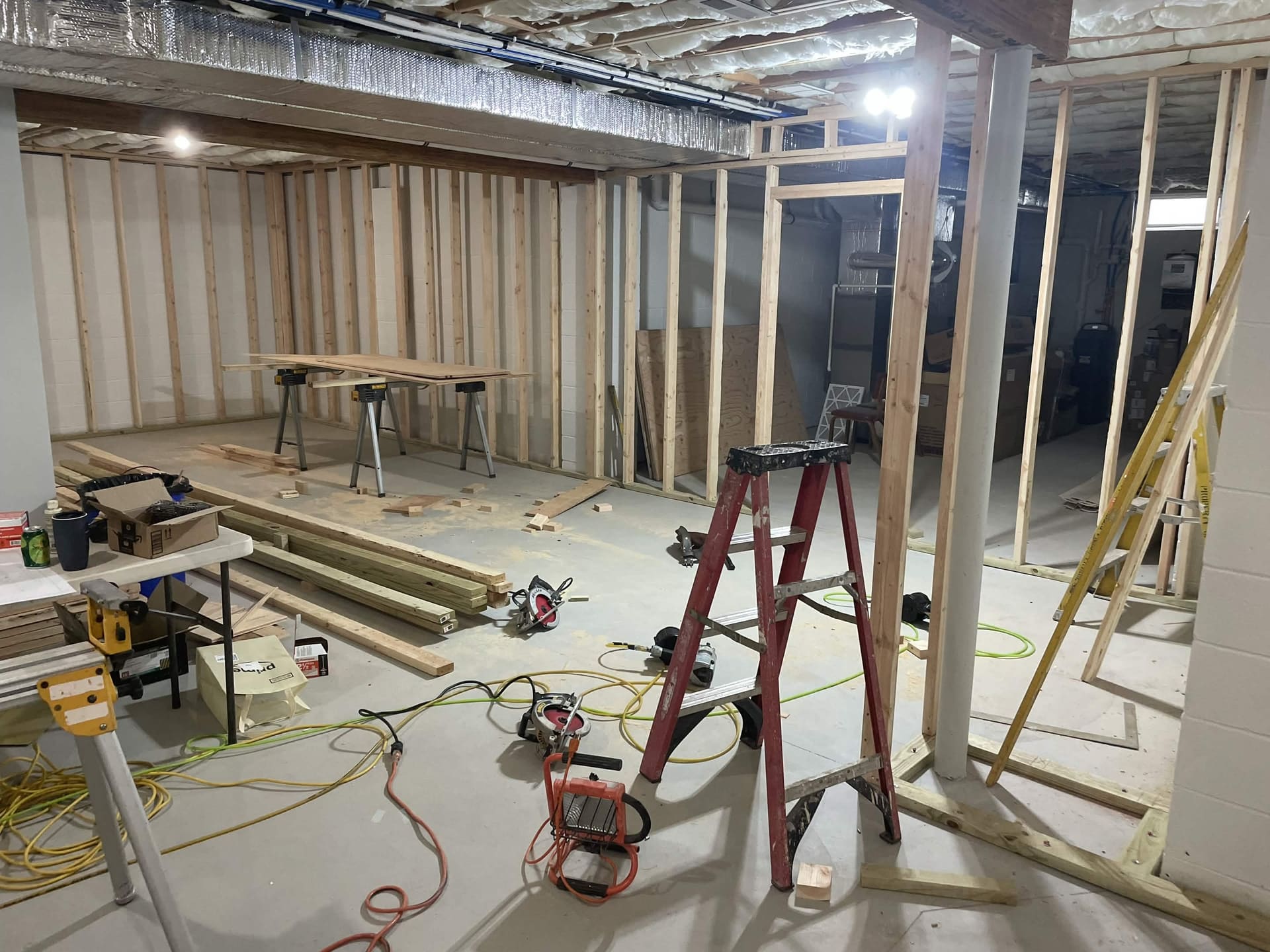 Basement renovation framing progress by Cursi Construction Inc.